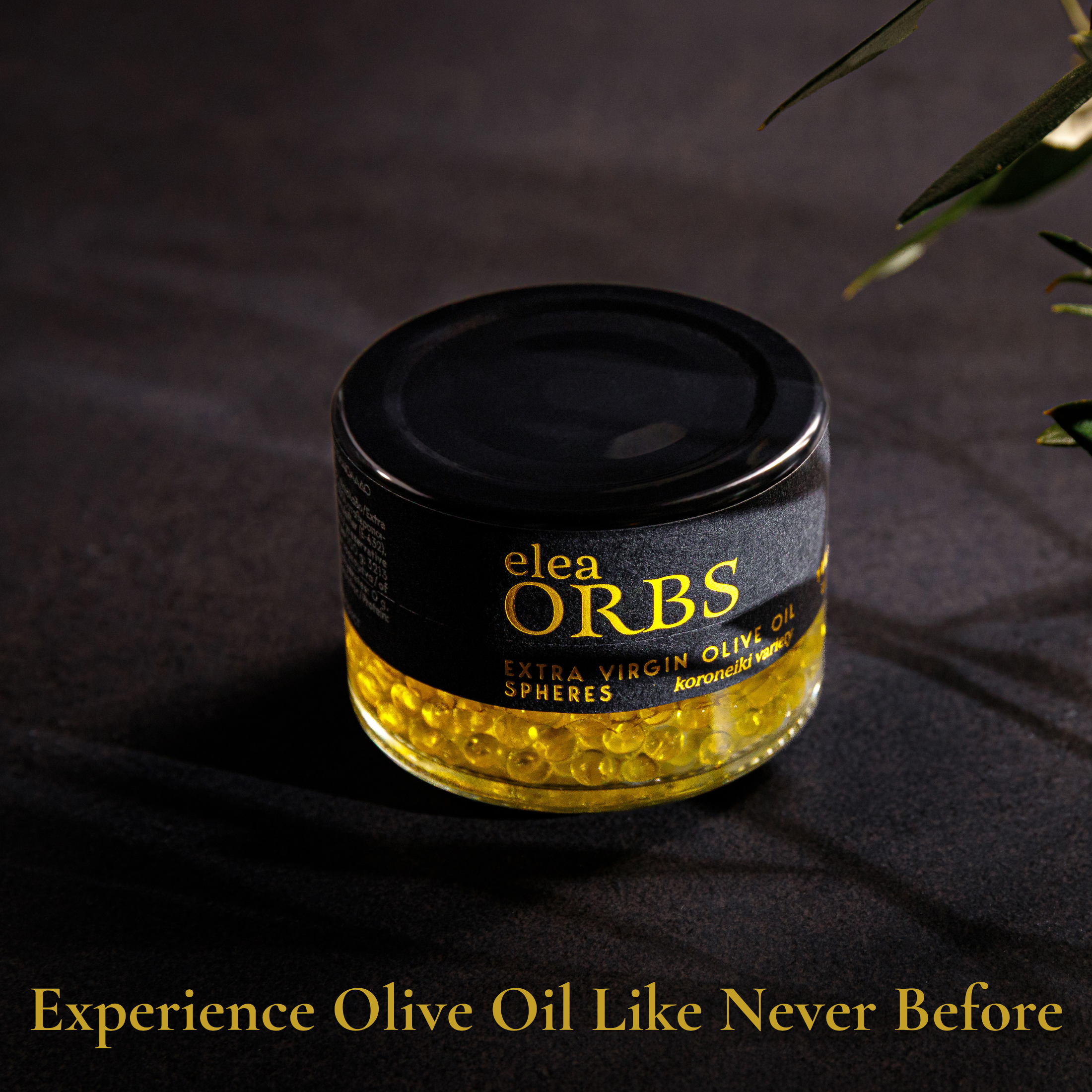 Elea Orbs overhead open jar of golden extra virgin olive oil spheres from Crete
